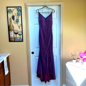 Vneck purple sparkling gown. This dress has a small train and slight open back.
